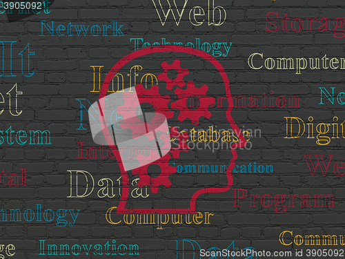 Image of Data concept: Head With Gears on wall background