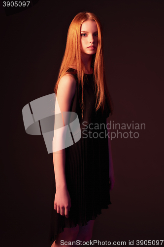 Image of Fashion portrait of beautiful red haired fashion model girl