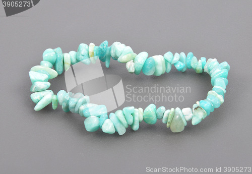 Image of Splintered amazonite chain on gray background