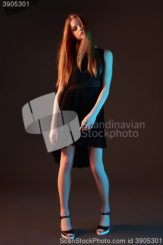 Image of Fashion portrait of beautiful red haired girl