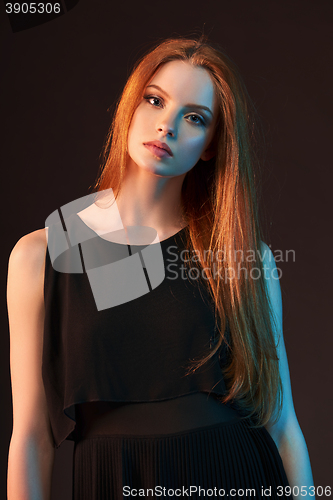 Image of Fashion portrait of beautiful red haired girl