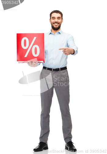 Image of smiling man with red shopping bag