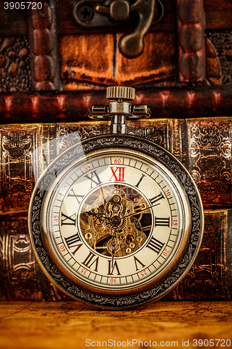 Image of Old Books and Vintage pocket watch