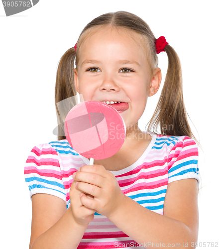 Image of Little girl with lollipop