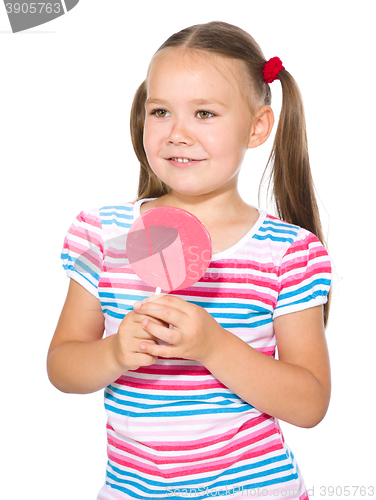 Image of Little girl with lollipop