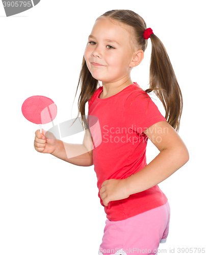 Image of Little girl with lollipop