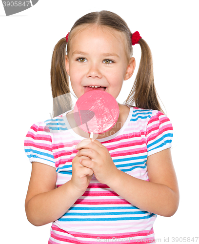 Image of Little girl with lollipop