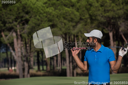 Image of golf player portrait at course