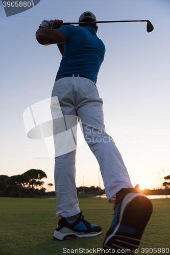 Image of golfer hitting long shot