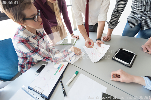 Image of top  view of business people group brainstorming on meeting