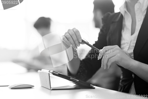 Image of female  hands holding pen on business meeting