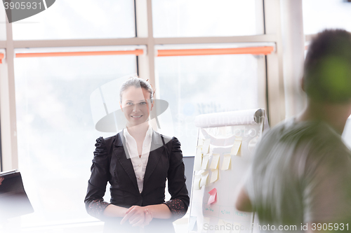 Image of portrait of young business woman at modern office