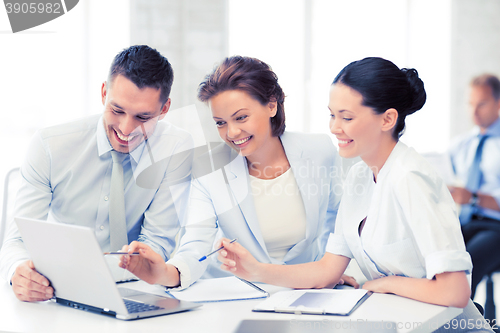 Image of business team having discussion in office