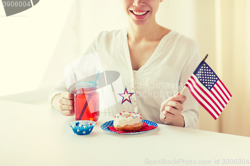 Image of happy woman celebrating american independence day