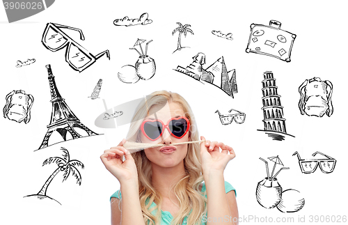 Image of happy young woman making mustache with her hair