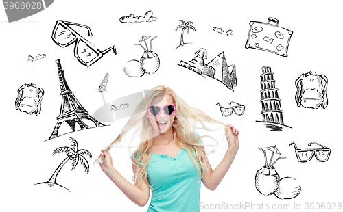 Image of happy young blonde woman or teenager in sunglasses