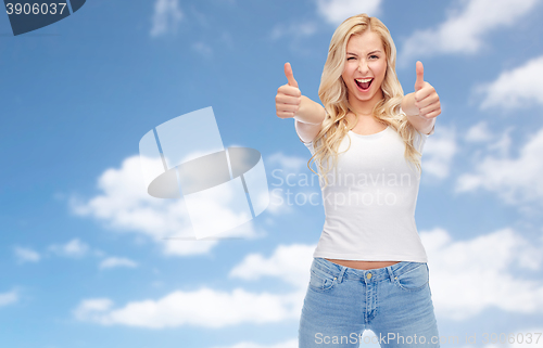 Image of happy young woman or teenage girl in white t-shirt