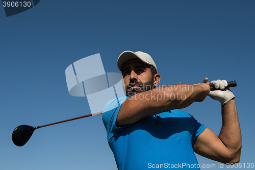 Image of golf player hitting shot