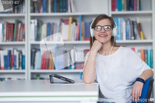 Image of female student study in library