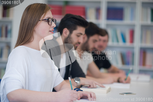 Image of group of students study together in classroom