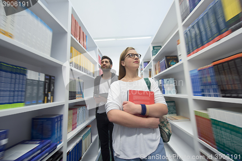 Image of students group  in school  library