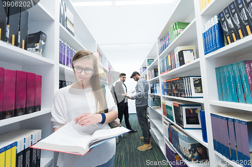 Image of students group  in school  library