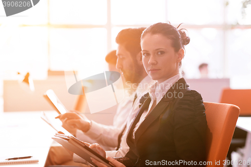 Image of business woman at  office people group on meeting  in background