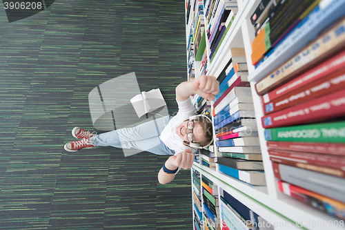 Image of female student study in library