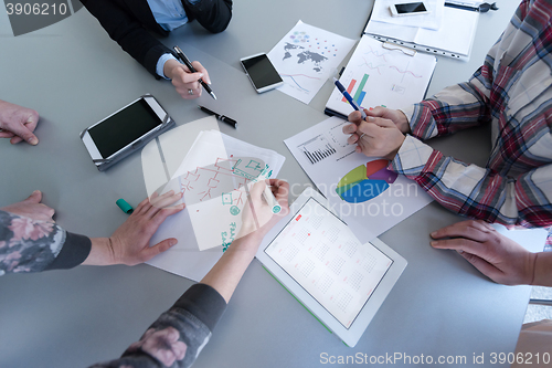 Image of top  view of business people group brainstorming on meeting