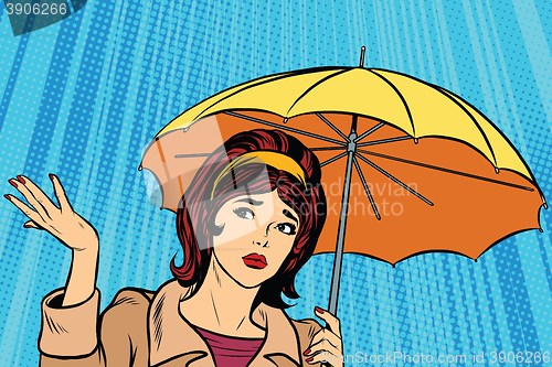 Image of Beautiful sad girl in rain with umbrella, bad weather
