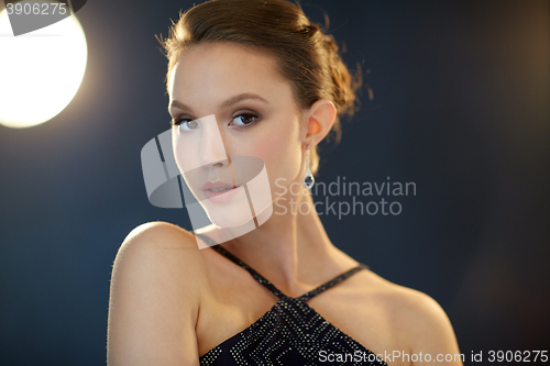 Image of beautiful young asian woman with earring