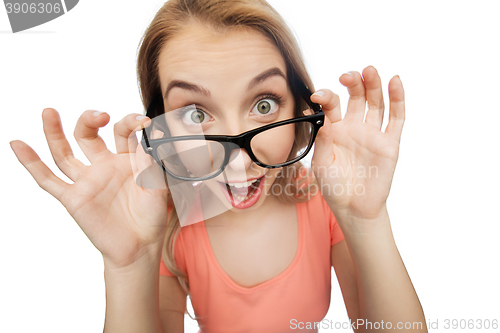 Image of happy young woman or teenage girl in eyeglasses