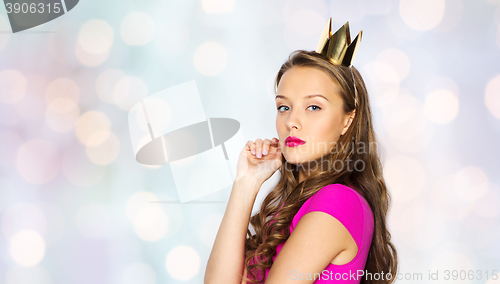 Image of young woman or teen girl in pink dress