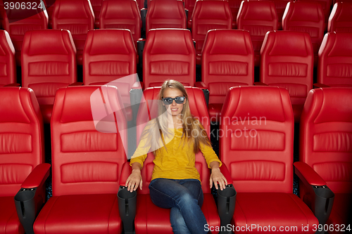 Image of young woman watching movie in 3d theater