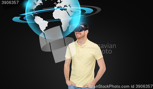 Image of happy man in virtual reality headset or 3d glasses