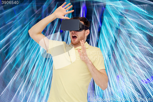 Image of happy man in virtual reality headset or 3d glasses