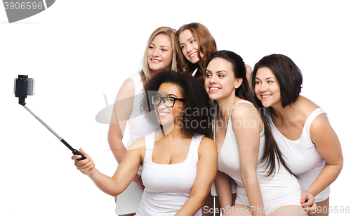 Image of group of happy women taking selfie by smartphoone