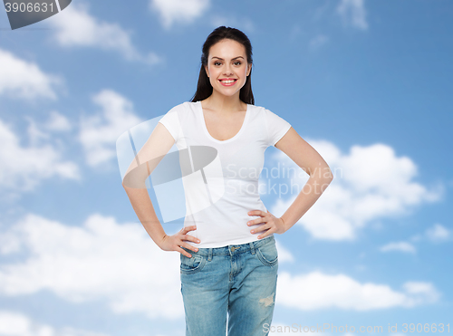 Image of happy young woman or teenage girl in white t-shirt