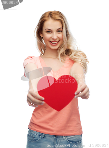 Image of happy woman or teen girl with red heart shape