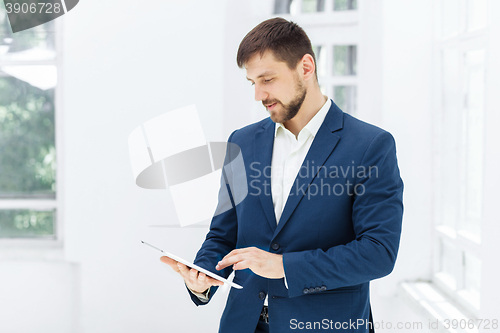 Image of The elegant businessman in  the office
