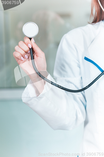 Image of Doctor with a stethoscope in the hands