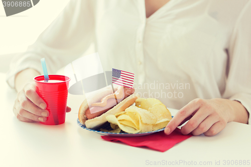 Image of woman celebrating american independence day