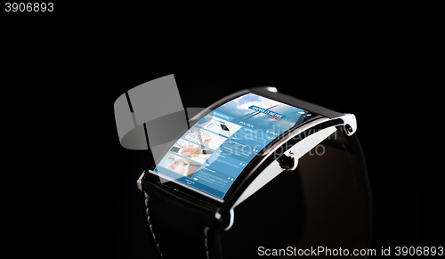 Image of close up of smart watch with news web page