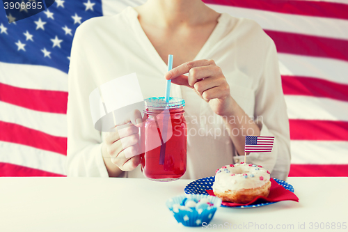 Image of woman celebrating american independence day