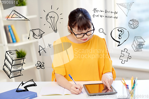 Image of asian woman student with tablet pc at home