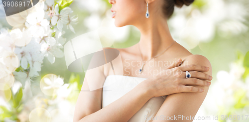 Image of close up of beautiful woman with finger ring