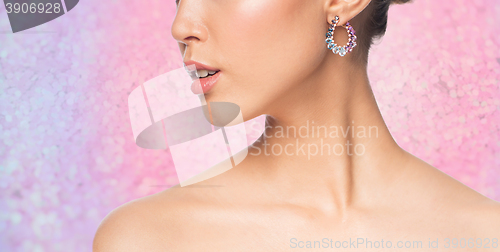 Image of close up of beautiful woman face with earring