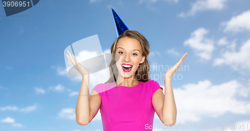 Image of happy young woman or teen girl in party cap