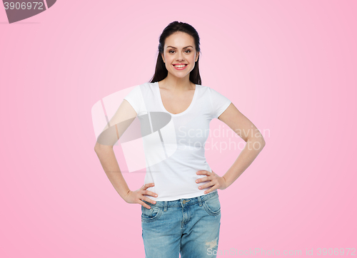 Image of happy young woman or teenage girl in white t-shirt