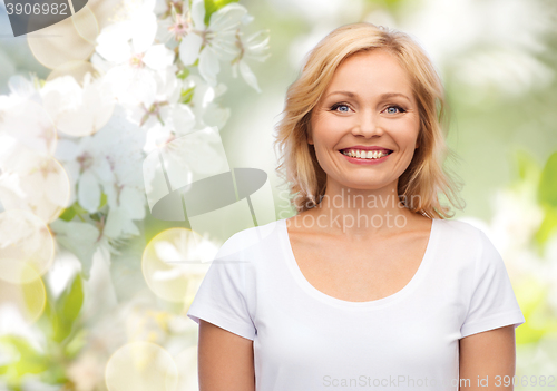 Image of smiling woman in blank white t-shirt